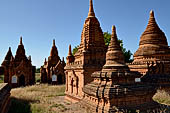 The cluster of red brick temples, named Khay-min-gha on the map on the North plain of Bagan. Myanmar. 